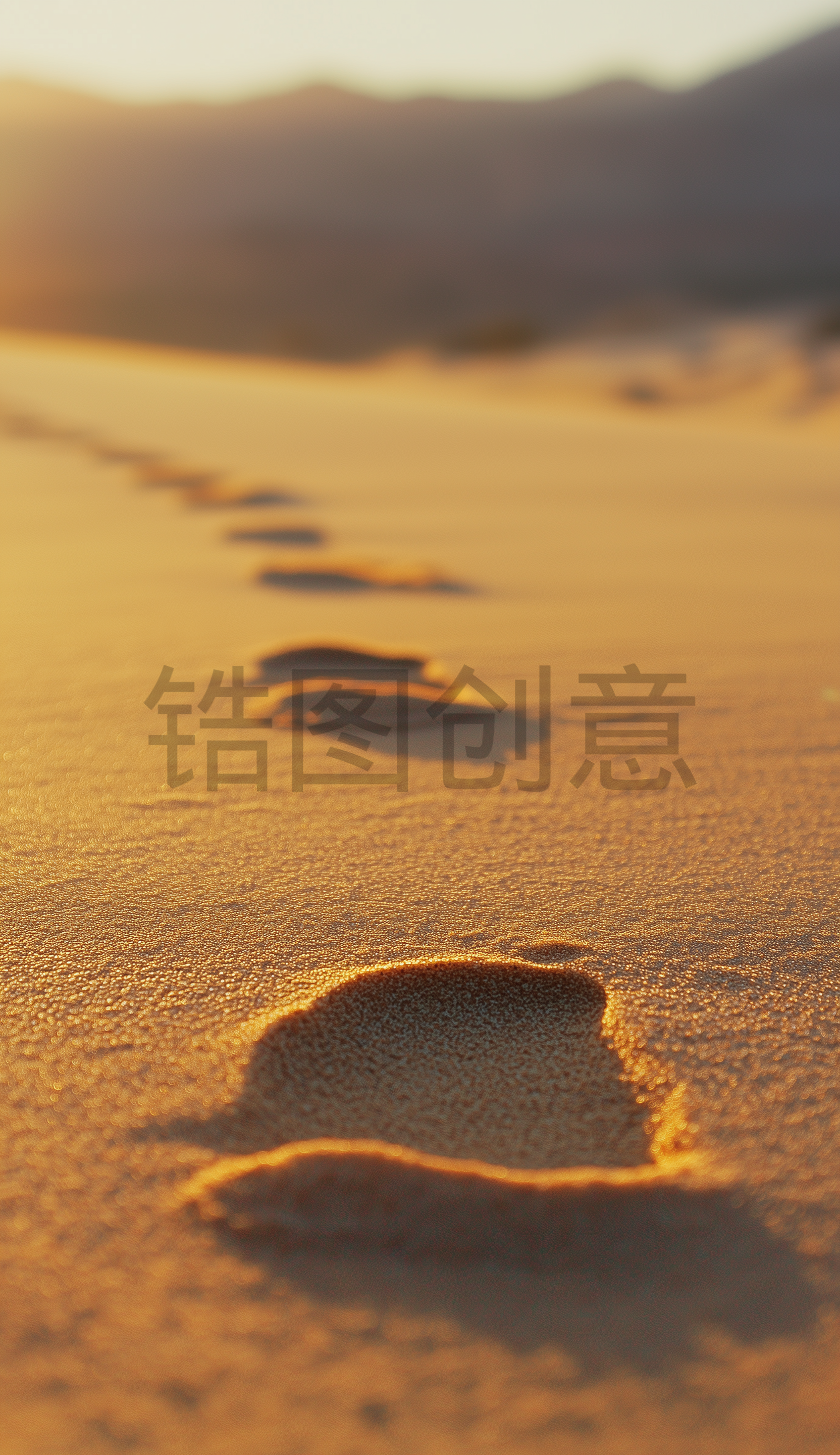 锆图创意-海边沙滩沙土上的脚印